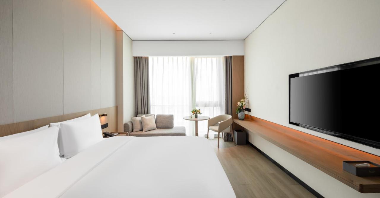 The Coli Hotel Jinan Bagian luar foto