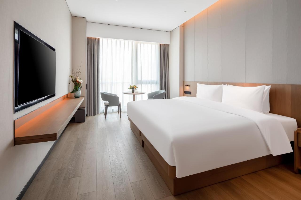 The Coli Hotel Jinan Bagian luar foto