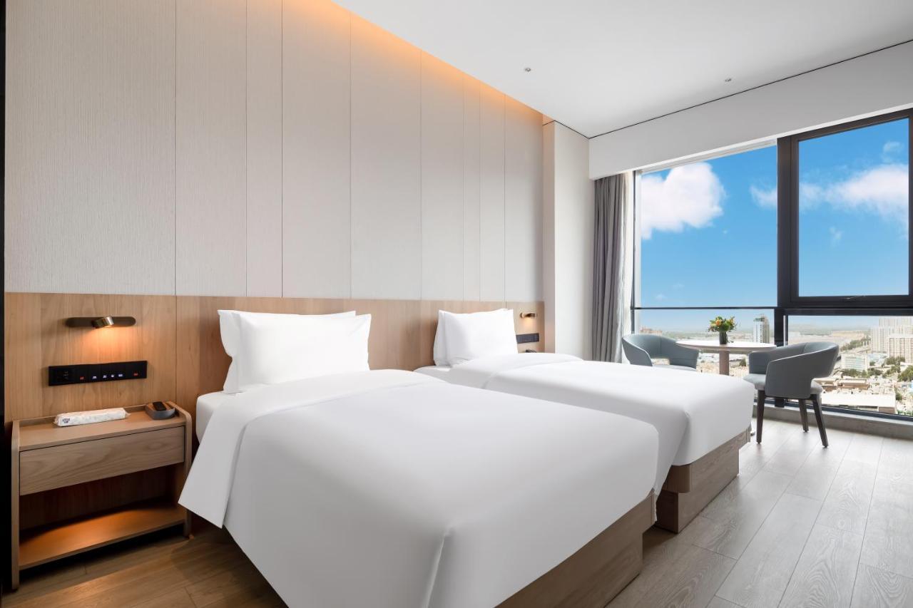 The Coli Hotel Jinan Bagian luar foto