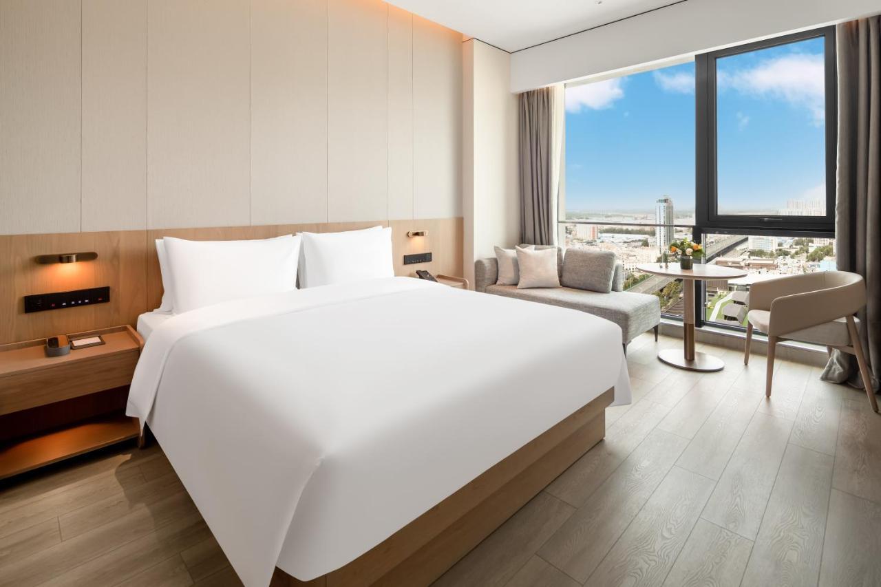 The Coli Hotel Jinan Bagian luar foto