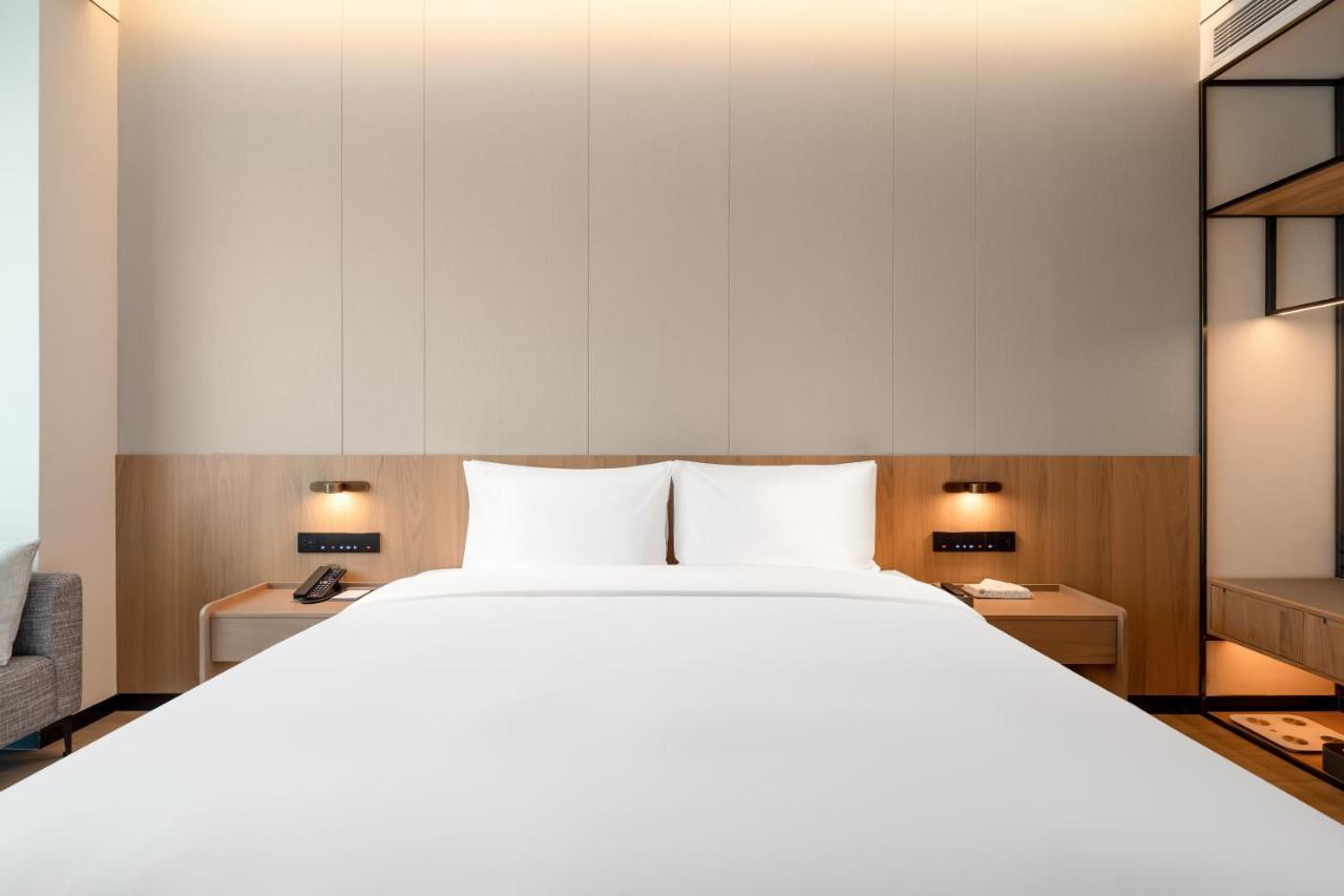 The Coli Hotel Jinan Bagian luar foto