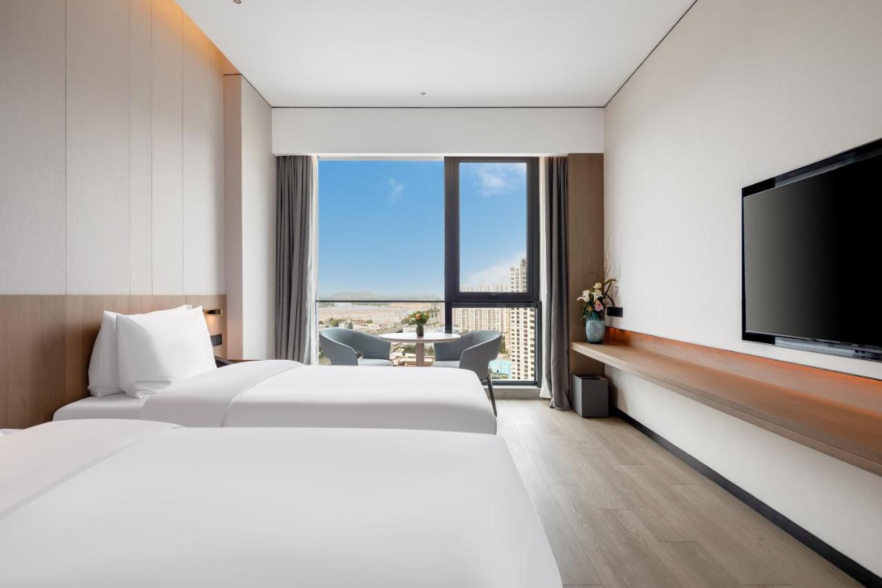 The Coli Hotel Jinan Bagian luar foto