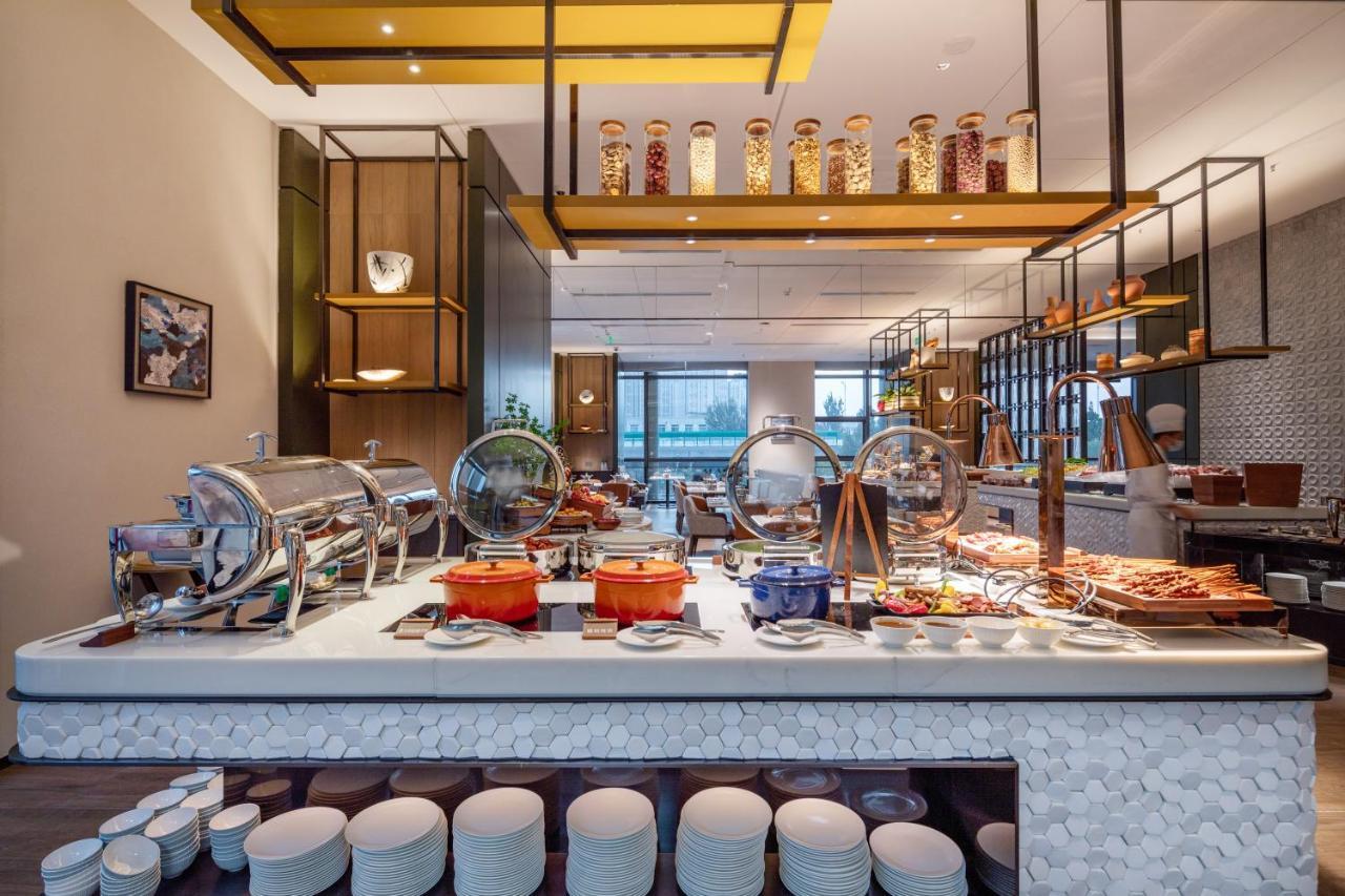 The Coli Hotel Jinan Bagian luar foto
